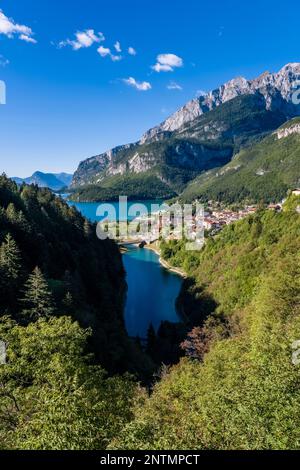 Aerial view of the Dolomites mountain range with dramatic clouds, deep ...