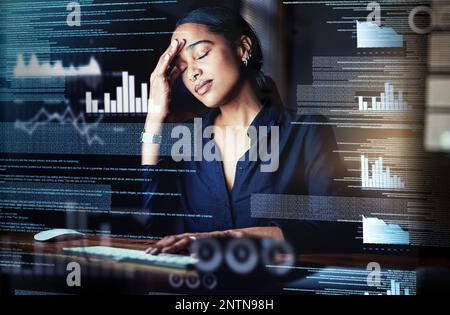 I dont think I can crack this. Shot of a programmer looking stressed out while working on a computer code at night. Stock Photo