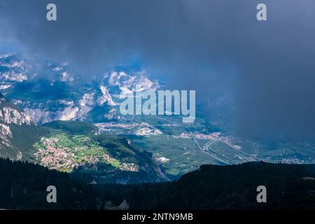 Aerial view on Eisack Valley with the small towns of Mezzolombardo and Mezzocorona from the top of the Cima Paganella mountain. Stock Photo