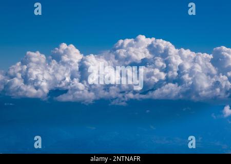 Storm clouds building up over the Dolomites, seen from the top of the Cima Paganella mountain. Stock Photo