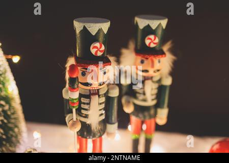 Christmas market details with New Year decorations and multicolored flags, garlands and festoons, Xmas atmosphere, fair interior, retail and store wit Stock Photo