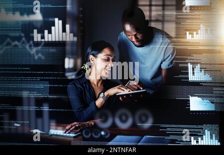 Adding modifications to their plans. Shot of two programmers using a digital tablet while working together on a computer code at night. Stock Photo