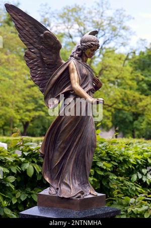 Statue of an angel made of bronze Stock Photo