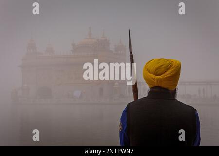 Guard, in Golden temple, Amritsar, Punjab, India Stock Photo