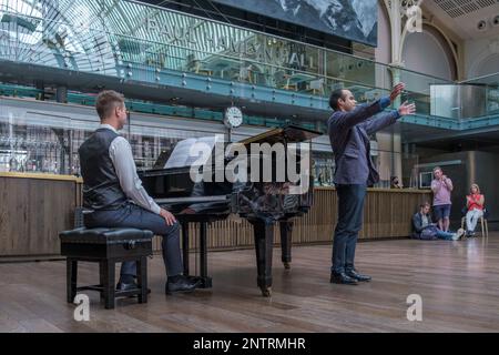 Tenor Alan Pingarron  performs accompanied by Edmund Whitehead at the Paul Hamlyn Hall (Floral Hall) Royal Opera House Covent Garden, London, UK Stock Photo