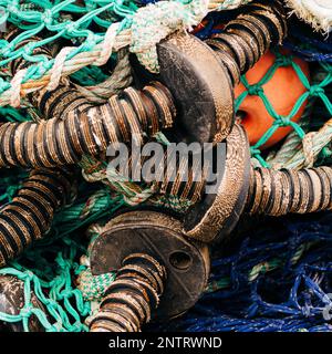 Mooring ropes and nets on a fishing boat. Accessories needed for fishing.  Spring season Stock Photo - Alamy