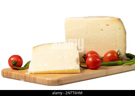 wheel cheese. Cheese made from cow's milk on a wooden flipchart. Turkish Gruyere Cheese Stock Photo