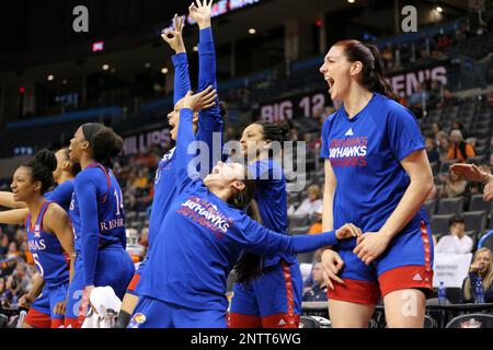 Oklahoma City, OK, USA. 24th May, 2019. Kansas Jayhawk teammate celebrate a  run scored during a 2019 Phillips 66 Big 12 Baseball Championship  quarterfinal game between the Kansas Jayhawks and the Texas