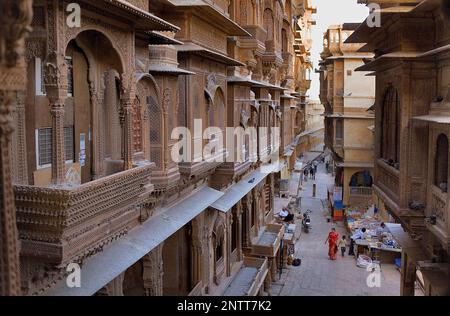 Street scene, at left Patwa-ki Haveli,Jaisalmer, Rajasthan, India Stock Photo