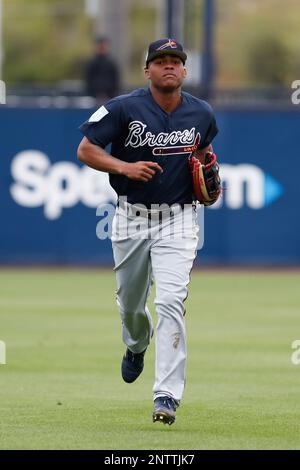 Jorge Mateo, of the Oakland Athletics, tags out Cristian Pache, of the  Atlanta Braves, during the seventh inning of the MLB All-Star Futures  baseball game, Sunday, July 7, 2019, in Cleveland. The