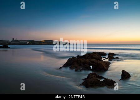 Sunset over Tarifa lighthouse at Los Lances beach Tarifa, Cadiz province, Andalusia, Spain Stock Photo