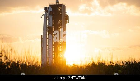 (230228) -- FLORIDA, Feb. 28, 2023 (Xinhua) -- This photo taken on Feb. 25, 2023 shows a SpaceX Falcon 9 rocket and the Dragon spacecraft at NASA's Kennedy Space Center in Florida, the United States. NASA and SpaceX are now targeting Thursday, March 2, for next available Crew-6 launch attempt after the original launch attempt was scrubbed early Monday. The launch of the Crew-6 mission to the International Space Station was originally scheduled at 1:45 a.m. Monday Eastern Time from Launch Complex 39A at the Kennedy Space Center in Florida. But the launch was called off due to a ground systems i Stock Photo