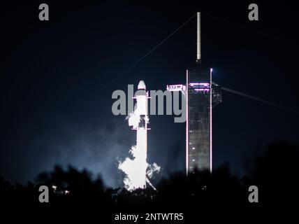 (230228) -- FLORIDA, Feb. 28, 2023 (Xinhua) -- This photo taken on Feb. 27, 2023 shows a SpaceX Falcon 9 rocket and the Dragon spacecraft at NASA's Kennedy Space Center in Florida, the United States. NASA and SpaceX are now targeting Thursday, March 2, for next available Crew-6 launch attempt after the original launch attempt was scrubbed early Monday. The launch of the Crew-6 mission to the International Space Station was originally scheduled at 1:45 a.m. Monday Eastern Time from Launch Complex 39A at the Kennedy Space Center in Florida. But the launch was called off due to a ground systems i Stock Photo