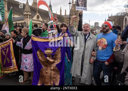 London/UK 27th FEB 2023. Crowds of supporters of Prince Reza Pahlavi gathered at Houses of Parliament hoping to catch a glimpse of the Prince. Aubrey Fagon/Alamy Live News