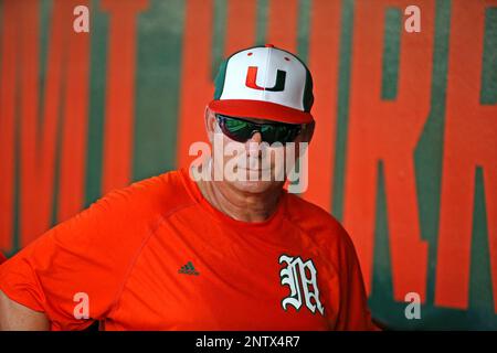 Miami Hurricanes head coach Gino DiMare gives instructions to his team  during the third inning of a NCAA baseball game against the Florida  Atlantic University Owls at Alex Rodriguez Park at Mark