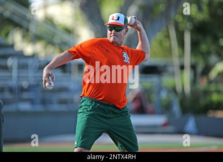 Miami Hurricanes head coach Gino DiMare gives instructions to his team  during the third inning of a NCAA baseball game against the Florida  Atlantic University Owls at Alex Rodriguez Park at Mark