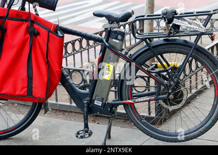 A lithium ion e bike battery installed in an electric bicycle. Stock Photo