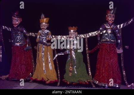 Kathputli is a string puppet theatre, native to Rajasthan, India, and is the most popular form of Indian puppetry. Being a string marionette, it is controlled by a single string that passes it from the top of the puppet over the puppeteers. Putli meaning a doll. Kathputli means a puppet which is made entirely from wood. However it is made out of wood, cotton cloth and metal wire. Stock Photo