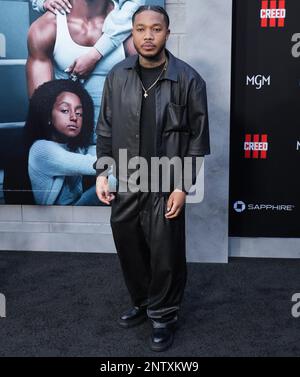 Los Angeles, USA. 27th Feb, 2023. Cozz arrives at the CREED III Los Angeles Premiere held at the TCL Chinese Theatre in Hollywood, CA on Monday, February 27, 2023. (Photo By Sthanlee B. Mirador/Sipa USA) Credit: Sipa USA/Alamy Live News Stock Photo