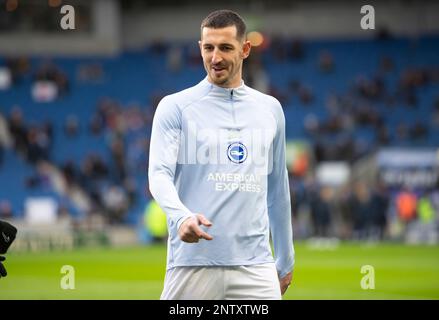 Brighton captain Lewis Dunk of Brighton smiling during the warm up before the Brighton and Hove Albion v Fulham Premier League match at the American Express Community Stadium, Brighton. Saturday 18th February 2023 Stock Photo