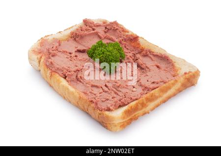 Studio shot of chicken liver pate spread on toast cut out against a white background - John Gollop Stock Photo