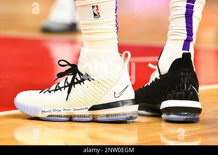 The names of Los Angeles Lakers' LeBron James' kids are written on his shoes  during an NBA basketball game against the Memphis Grizzlies Sunday, Dec. 23,  2018, in Los Angeles. (AP Photo/Marcio