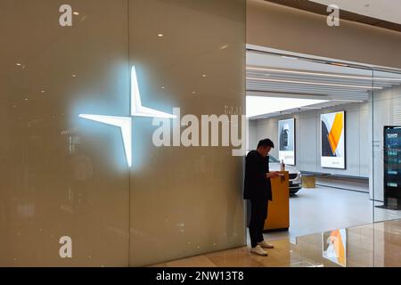 SHANGHAI, CHINA - FEBRUARY 28, 2023 - Customers talk to staff about Polestar Polestar2 at a Polestar car store in Shanghai, China, February 28, 2023. Stock Photo