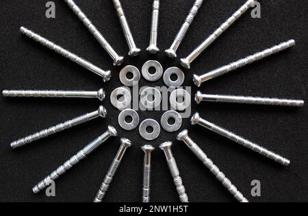 Cross Head Furniture Bolts Laid Out In Form Of Circle With Aluminum Washers Inside Detailed Top View Stock Photo