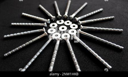Furniture Bolts And Metal Washers For Furniture Mounting Laid Out In Round Order Angle View Stock Photo