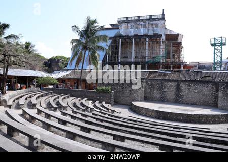 Zanzibar. 26th Feb, 2023. This photo taken on Feb. 26, 2023 shows the House of Wonders (above) and an amphitheater in the Stone Town of Zanzibar, Tanzania. The Stone Town of Zanzibar used to be the capital of the Sultanate of Zanzibar. It is a melting pot of various African, Asian and European cultures. In 2000, the historical town was listed as a UNESCO World Cultural Heritage site. Credit: Dong Jianghui/Xinhua/Alamy Live News Stock Photo