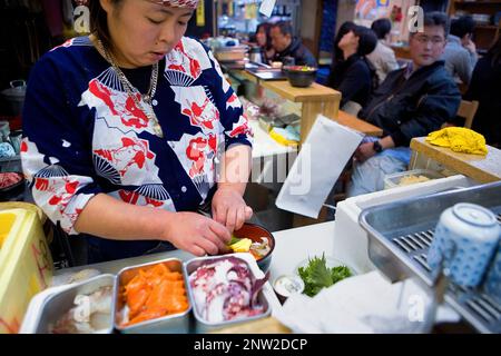 Restaurant in Tsukiji market, biggest fishmarket in the world .Tokyo city, Japan, Asia Stock Photo