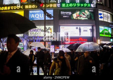 Street scene, in background facade of Yodobashi Akiba, at Kanda Hanaokacho, Akihabara, Tokyo, Japan Stock Photo