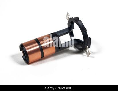 Car alternator slip rings isolated on white background, close-up. Stock Photo