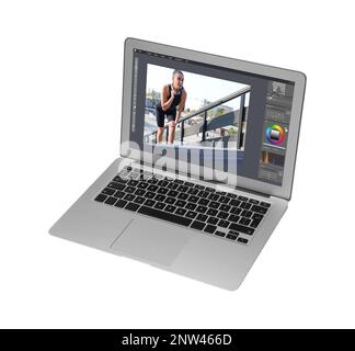 Laptop with photo editor application isolated on white Stock Photo