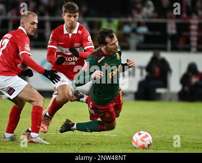 Fonbet - Russian Football Cup 2022/23. Match between the teams Spartak ( Moscow) - Lokomotiv (Moscow) at the stadium Opening Arena. From left to  right: Spartak team players Quincy Promes, Mikhail Ignatov and