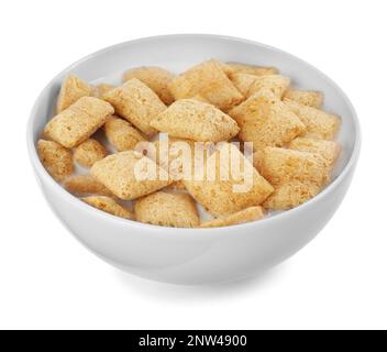 Tasty corn pads with milk in bowl isolated on white Stock Photo