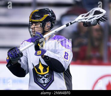 San Diego Seals player Austin Staats, rt, battles with Calgary Roughnecks  player Shane Simpson during NLL lacrosse action in Calgary, Alta., on Sat.,  Feb. 29, 2020. (Larry MacDougal via AP Stock Photo - Alamy