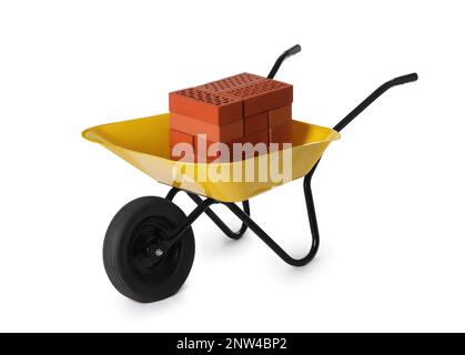 Red bricks in wheelbarrow on white background Stock Photo