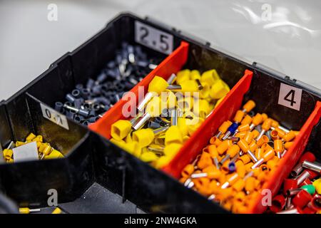 A close up of a tool box with a lot of different electrical pins Stock Photo