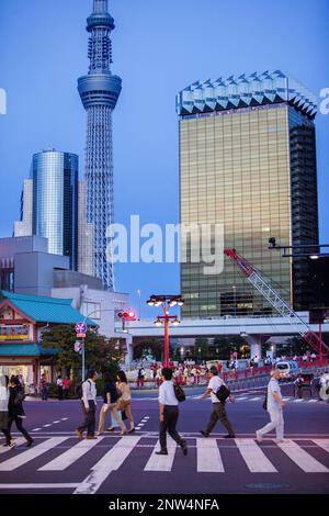 Crosswalk in Kaminarimon street, in background Sky Tree, Asakusa District, Tokyo, Japan Stock Photo