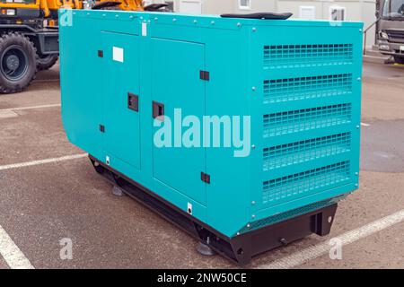 Emergency Aux Electric Power Generator Outside at Parking Lot Stock Photo