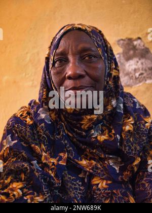 An old african woman portrait looking at the camera Stock Photo