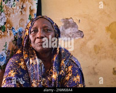 An old african woman portrait looking at the camera Stock Photo