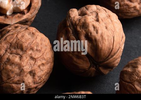 walnuts on black slate background Stock Photo