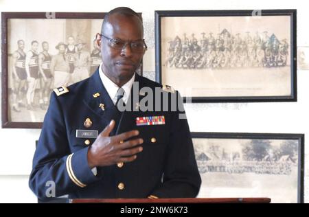 Illinois Army National Guard Chaplain (Lt. Col.) Vince Lambert speaks at his promotion ceremony in Memorial Hall in the Illinois Army National Guard's historic General Richard L. Jones Armory on Chicago's South Side. Chaplain Lambert, of Evergreen Park, Illinois, spent nearly two decades in finance, investment and bank management before deciding to join the Army as a member of the Chaplain Corps. “It was a surprising pivot,” said LaTonia Lambert, who has been married to Lambert for 28 years but has only been an Army Chaplain's wife for half that time. 'It was something he really wanted to do. Stock Photo