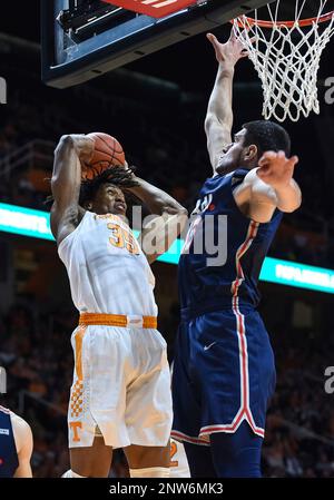 KNOXVILLE TN DECEMBER 19 Tennessee Volunteers forward Yves Pons 35 goes in for a dunk over Samford Bulldogs forward Stefan Lakic 15 during a college basketball game between the Tennessee Volunteers