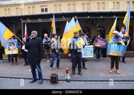 Cracow. Krakow. Poland.Ukrainian refugees on daily rally in front of US consulate asking NATO to close the sky over Ukraine Stock Photo