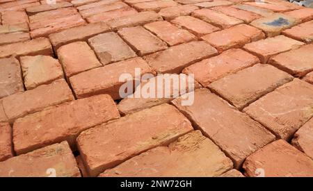 In the pile is a ready-made fired brick made of clay Stock Photo