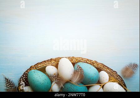 Easter composition on blue wooden background Stock Photo