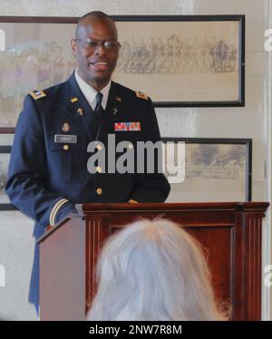 Illinois Army National Guard Chaplain (Lt. Col.) Vince Lambert speaks at his promotion ceremony in Memorial Hall in the Illinois Army National Guard's historic General Richard L. Jones Armory on Chicago's South Side. Chaplain Lambert, of Evergreen Park, Illinois, spent nearly two decades in finance, investment and bank management before deciding to join the Army as a member of the Chaplain Corps. “It was a surprising pivot,” said LaTonia Lambert, who has been married to Lambert for 28 years but has only been an Army Chaplain's wife for half that time. 'It was something he really wanted to do. Stock Photo